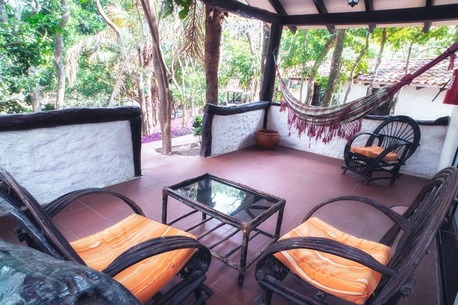 Terraza con hamaca de la Cabaña Deluxe Familiar