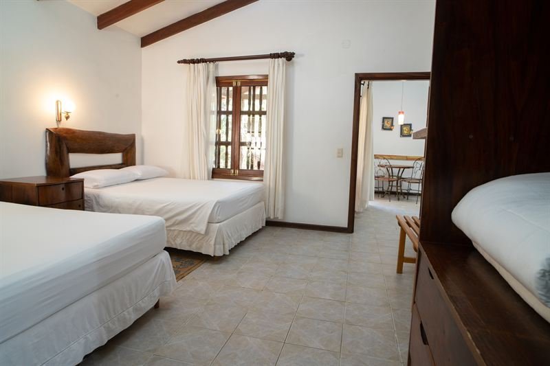 Segunda habitación con dos camas de la Cabaña Especial Familiar